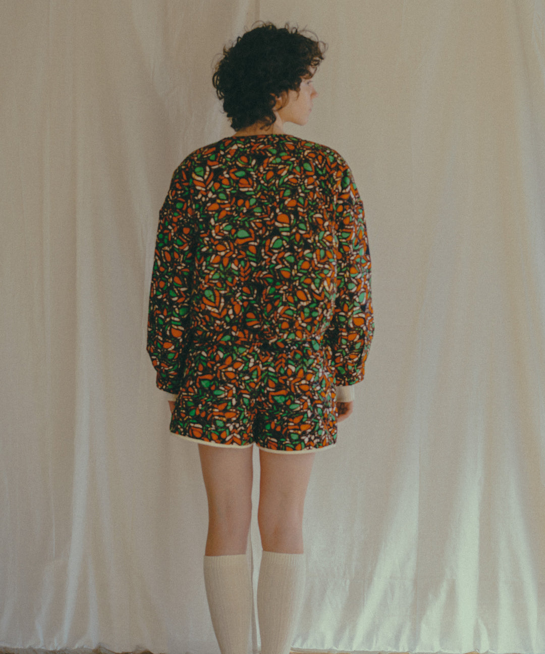AFRICA REVERSIBLE PADDED SHORT BLOUSON