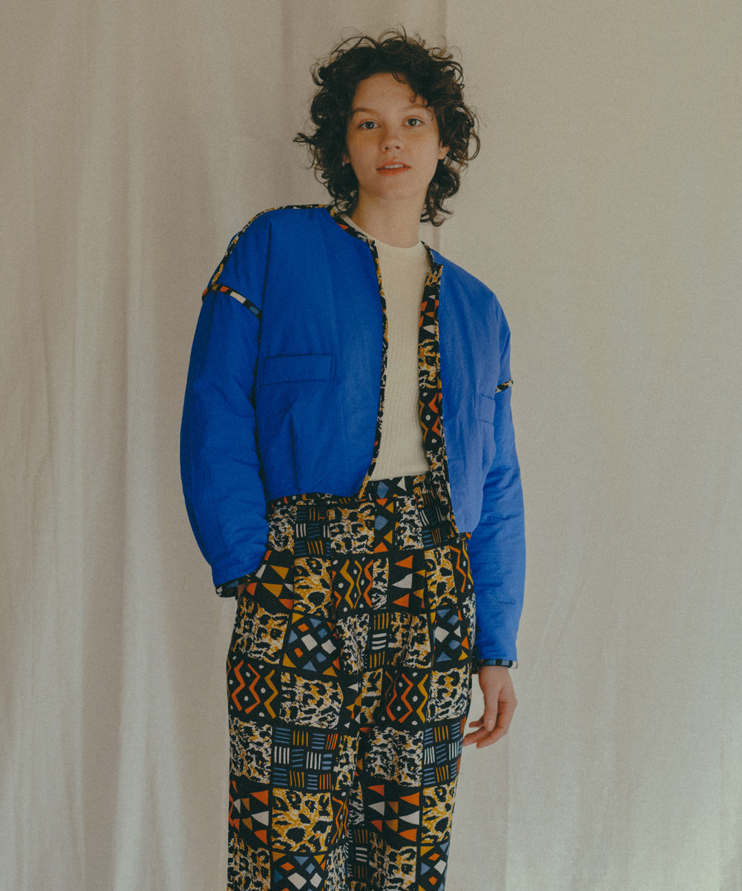 AFRICA REVERSIBLE PADDED SHORT BLOUSON
